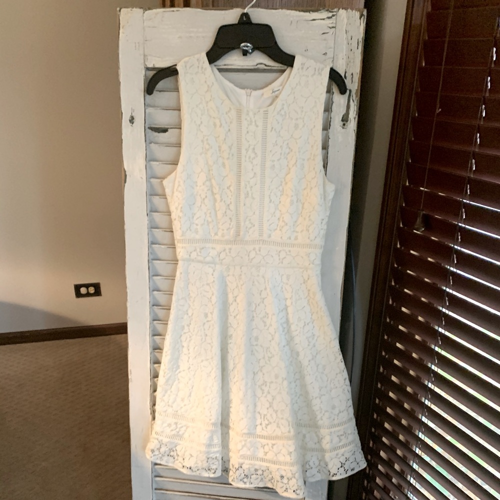 Adorable, white lace dress. Simple A line cut